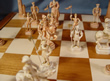 French Ivory Figural Set - Pieces on Chessboard